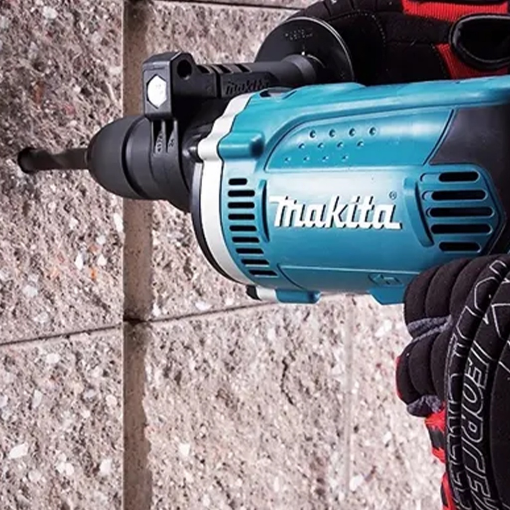 Taladro de Percusión makita 13 mm 710 W reversible con maleta